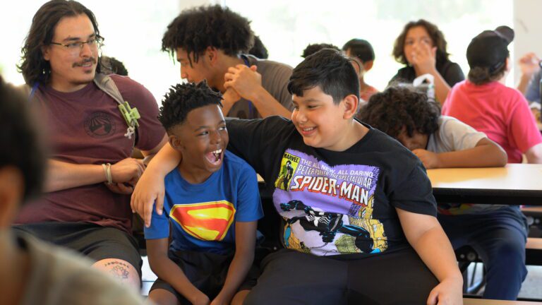 Two Friends at Camp Hope smiling and happy